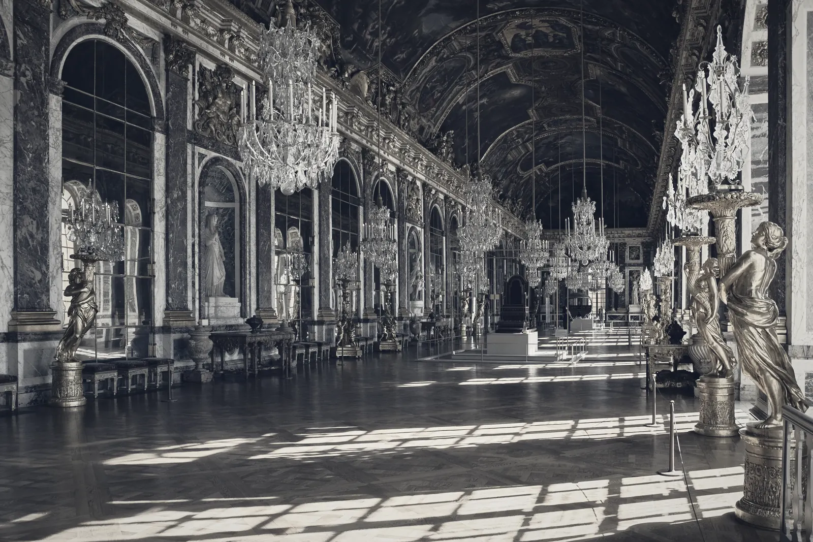A mirrored gallery running the length of a palace