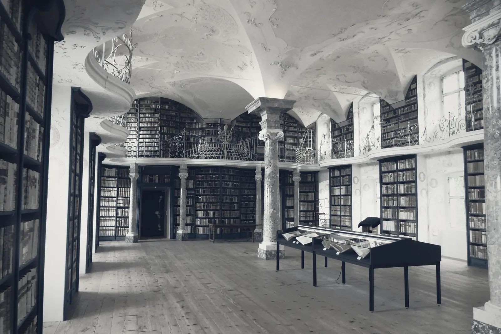 The long axis of an abbey library lined with reading desks